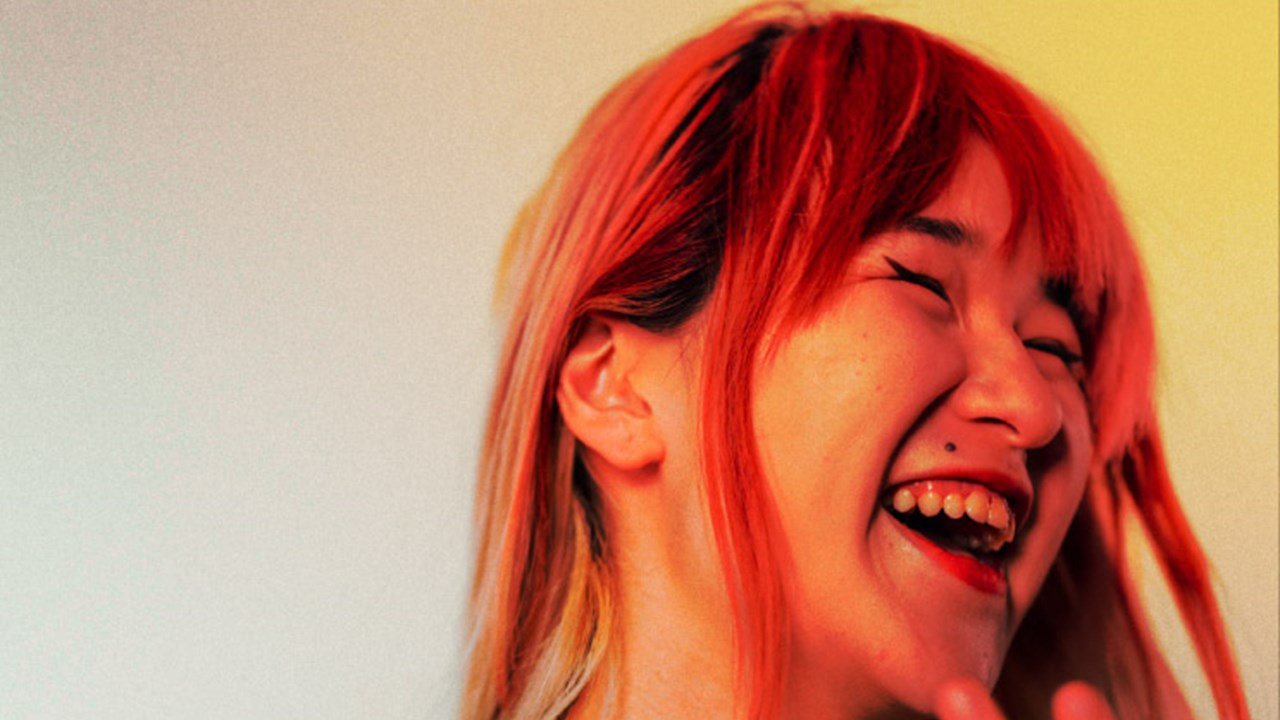 Red headed woman laughing